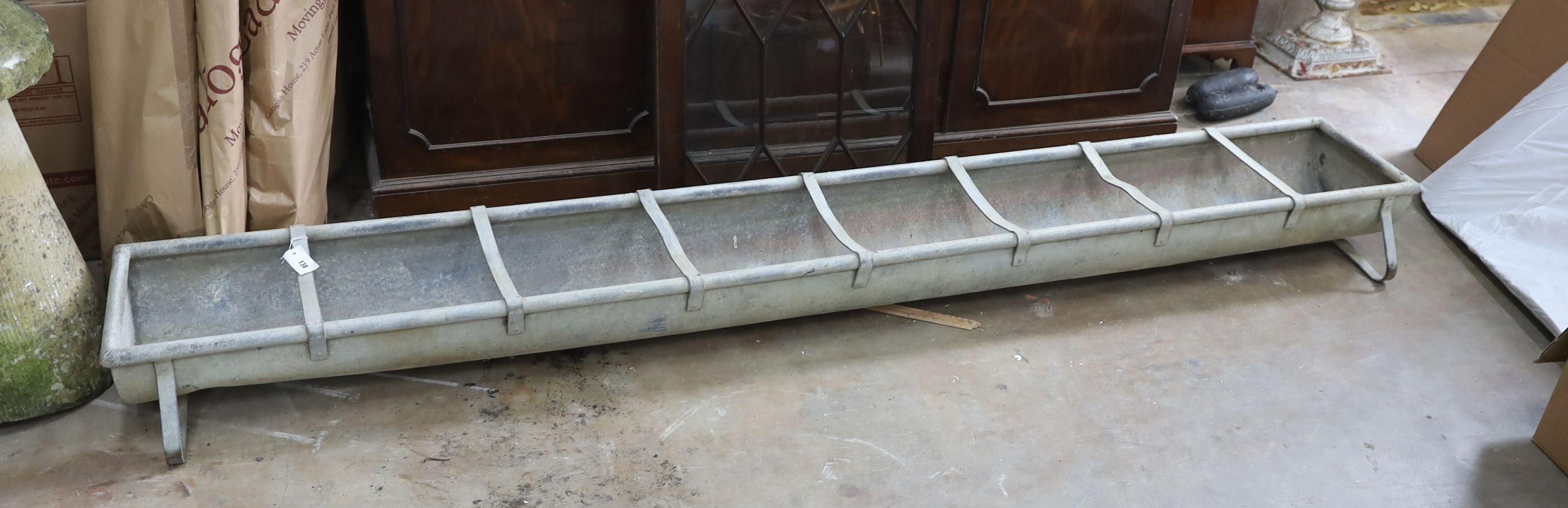 A large vintage galvanised water trough, length 246cm, depth 34cm, height 20cm